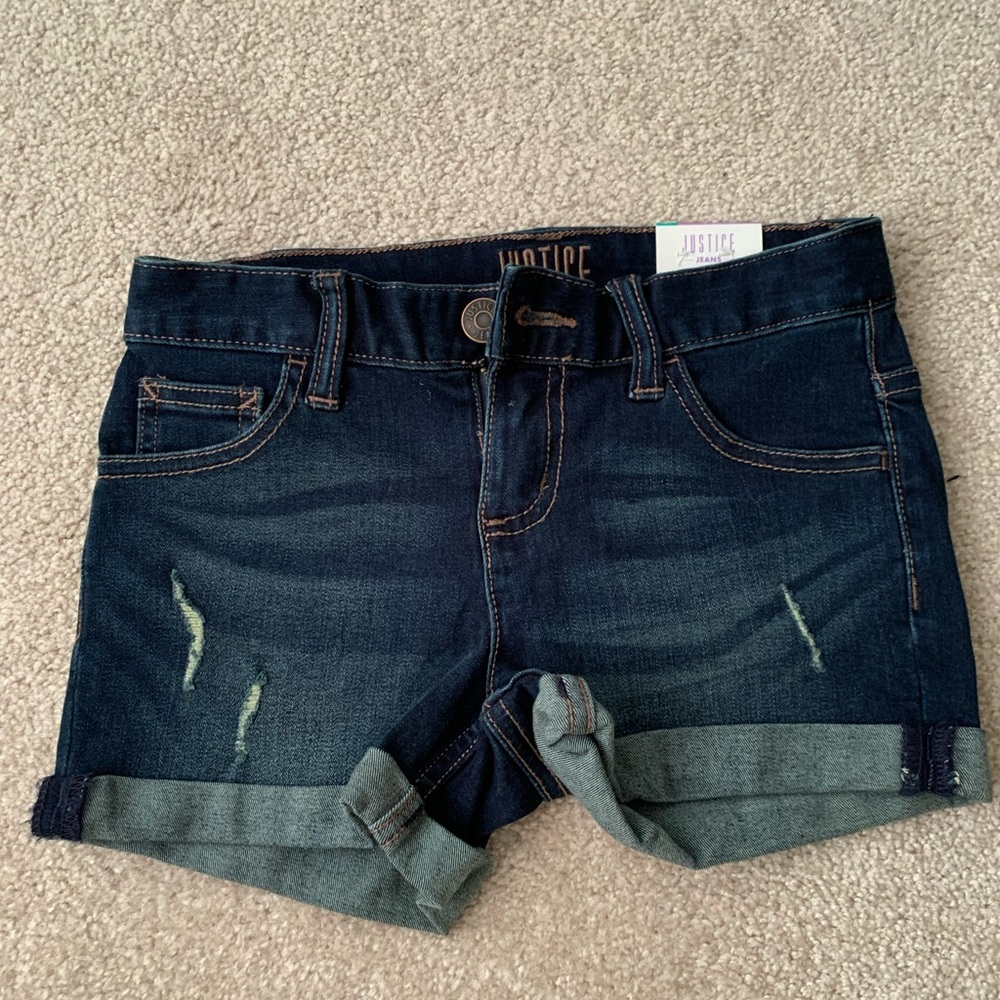 Brand new jean shorts with little rips.